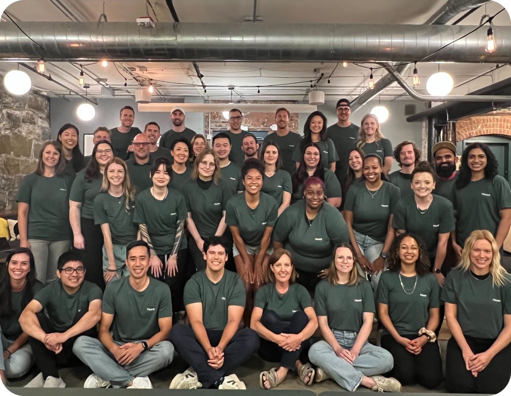 the heard team smiling for a group photo